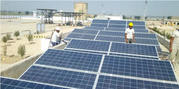Engineers on Solar Panel Rooftop.