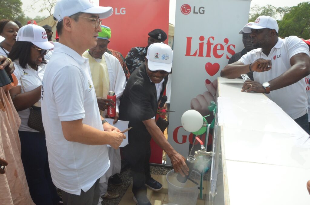 officials of the Lg electronics company at the commisioning of Solar-powered borehole in Abuja to commemorate the United Nations World Water Day